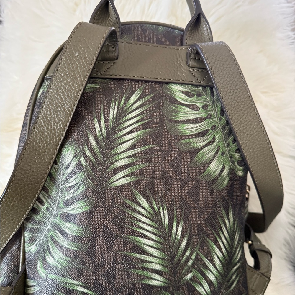 Michael Kors woman’s Backpack with Green Leaf Design.
Used good condition - Picture 3 of 5